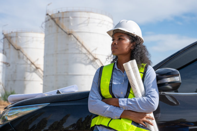 Engineer industrial facility petrochemical or gas energy site focused  balance between industrial development and environmental preservation  impact while maintaining efficiency and safety standards